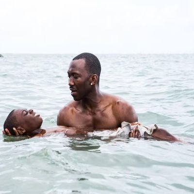 Photo of Alex R. Hibbert and Mahershala Ali during a movie scene.